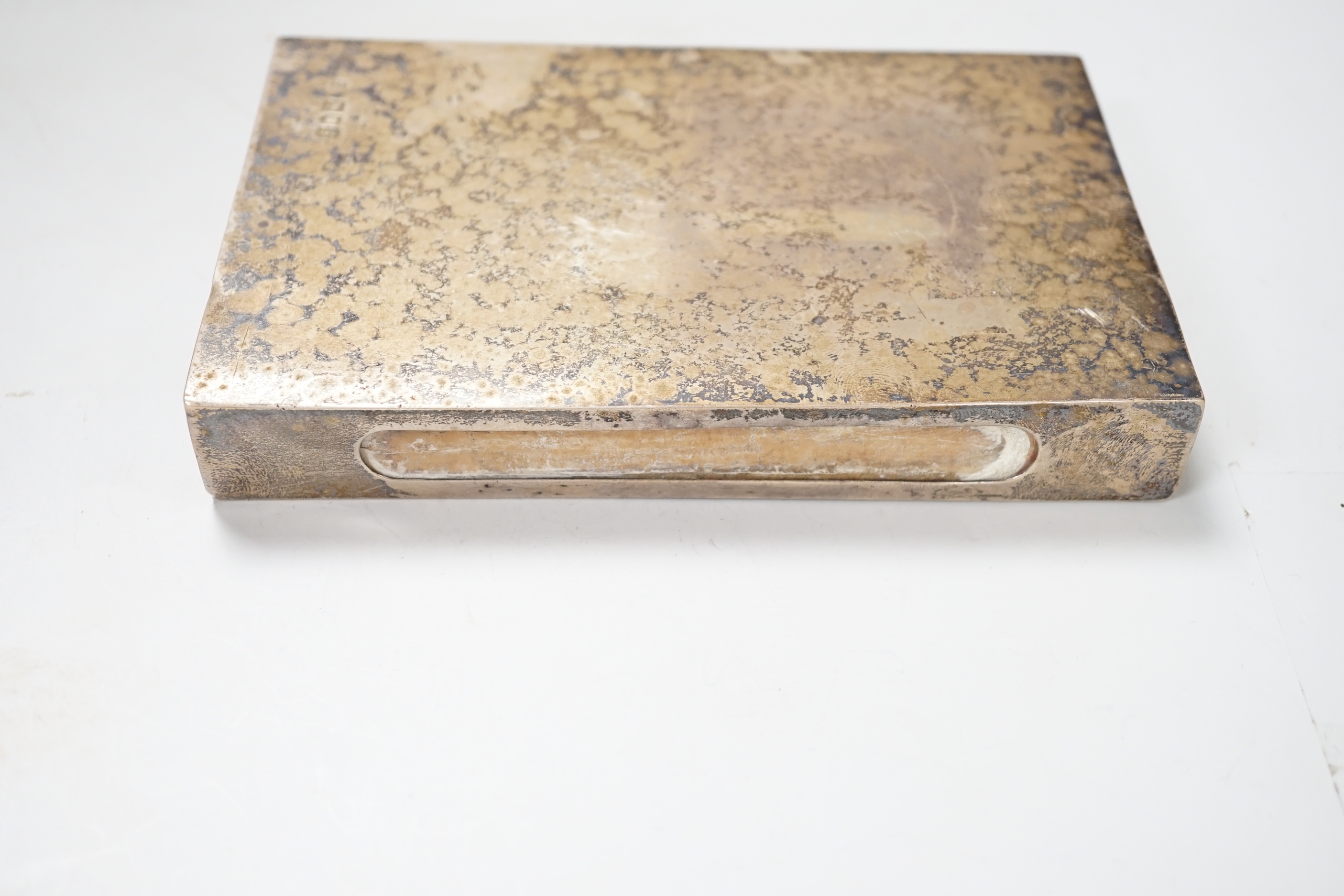 A large George V silver matchbox holder with vintage Swan Vesta's matchbox inside, London 1913, 16cm, net weight 223 grams, and a George V crocodile and glass pocket flask with plated mounts